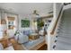 Bright living room with comfortable seating, stylish decor, and open floor plan at 1466 Mizzen Aly, Johns Island, SC 29455