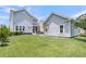 Spacious backyard features manicured lawn and fencing, offering a blend of privacy and outdoor living space at 1601 Bourne Xing, Mount Pleasant, SC 29466