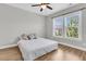 Bright bedroom featuring hardwood floors and two large windows with natural lighting at 1601 Bourne Xing, Mount Pleasant, SC 29466