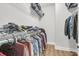 Spacious walk-in closet with ample wire shelving for folded and hanging clothes at 1601 Bourne Xing, Mount Pleasant, SC 29466