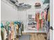 Organized walk-in closet with wire shelving for clothing and accessories at 1601 Bourne Xing, Mount Pleasant, SC 29466