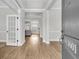 Bright and spacious foyer with hardwood floors, leading into the home's inviting living spaces at 1601 Bourne Xing, Mount Pleasant, SC 29466
