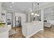 Spacious kitchen with white cabinets, granite countertops, stainless steel appliances, and open to the living area at 1601 Bourne Xing, Mount Pleasant, SC 29466
