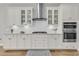 Bright kitchen with white cabinets, stainless steel appliances, and modern fixtures, ready for cooking and entertaining at 1601 Bourne Xing, Mount Pleasant, SC 29466