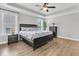 Spacious main bedroom featuring modern decor, ample natural light, and sleek furnishings for a comfortable retreat at 1601 Bourne Xing, Mount Pleasant, SC 29466