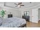 Comfortable main bedroom with neutral walls, modern ceiling fan, and stylish furnishings creating a serene atmosphere at 1601 Bourne Xing, Mount Pleasant, SC 29466
