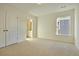 Cozy bedroom with a window view, neutral carpeting, and a convenient closet at 171 Threaded Fern Lndg, Summerville, SC 29485