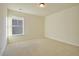 Clean bedroom featuring carpet floors and a large window looking to the outside at 171 Threaded Fern Lndg, Summerville, SC 29485