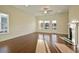 Bright living room featuring hardwood floors, a ceiling fan, a fireplace, and lots of natural light at 171 Threaded Fern Lndg, Summerville, SC 29485