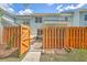 Fenced backyard with stone pathway to outdoor living space at 1723 Brittlebush Ln, Johns Island, SC 29455