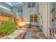 Private backyard with a stone fire pit and lounge seating at 1723 Brittlebush Ln, Johns Island, SC 29455