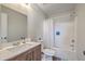 Cozy bathroom features a single sink vanity with a shower and tub combo at 1723 Brittlebush Ln, Johns Island, SC 29455