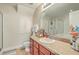 Bathroom featuring vanity, cabinets, a sink, toilet and glass-enclosed shower at 1723 Brittlebush Ln, Johns Island, SC 29455