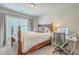 Bedroom featuring a decorative wood bed and a computer desk area at 1723 Brittlebush Ln, Johns Island, SC 29455