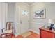 Entryway featuring hardwood floors, a front door with decorative glass, and a side table at 1723 Brittlebush Ln, Johns Island, SC 29455