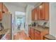 Updated kitchen with stainless refrigerator, granite counters, and eat-in breakfast nook at 1723 Brittlebush Ln, Johns Island, SC 29455