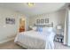 Comfortable bedroom featuring a wrought-iron bed frame and carpet floors at 1723 Brittlebush Ln, Johns Island, SC 29455