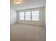 Bedroom with neutral carpet and three windows at 175 Threaded Fern Lndg, Summerville, SC 29485