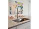 Kitchen sink with granite countertop and modern fixtures at 1819 Nola Run, Summerville, SC 29485
