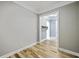 Neutral bedroom featuring wood-look floors, fresh paint, and elegant trim at 200 River Landing Dr # 307B, Charleston, SC 29492