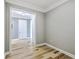 Neutral bedroom featuring wood-look floors, fresh paint, and elegant trim at 200 River Landing Dr # 307B, Charleston, SC 29492