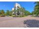 Elegant multi-story condominium with manicured landscaping and striking architectural details at 200 River Landing Dr # 307B, Charleston, SC 29492