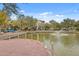 Beautiful pond and fountain with brick patio and manicured lawns surrounding condo complex at 200 River Landing Dr # 307B, Charleston, SC 29492