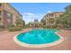 Large community swimming pool with gazebo and lots of seating surrounded by lush trees at 200 River Landing Dr # 307B, Charleston, SC 29492