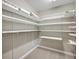Spacious walk-in closet with custom shelving and ample storage space at 200 River Landing Dr # 307B, Charleston, SC 29492
