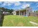 An expansive backyard featuring an inviting covered patio area at 201 Maywood Dr, Moncks Corner, SC 29461