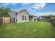 The house features a large, well-maintained backyard and patio area at 201 Maywood Dr, Moncks Corner, SC 29461