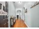Inviting entryway with hardwood floors and arched doorways to the adjacent living spaces at 201 Maywood Dr, Moncks Corner, SC 29461