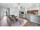 Cozy living room featuring a comfortable gray sectional sofa, ceiling fan, and open layout at 201 Maywood Dr, Moncks Corner, SC 29461