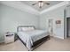 This well-lit main bedroom has a ceiling fan and ensuite bathroom at 201 Maywood Dr, Moncks Corner, SC 29461
