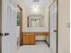 Well-lit bathroom featuring a vanity with storage and a sink at 202 Woodbridge Dr, Summerville, SC 29486