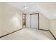 Large bedroom featuring white carpet, trim, and paint, and a double door closet at 202 Woodbridge Dr, Summerville, SC 29486