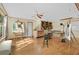 Spacious bonus room featuring hardwood floors, natural light, and a ceiling fan at 202 Woodbridge Dr, Summerville, SC 29486