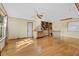 Bright bonus room features hardwood floors, natural light, and shelving at 202 Woodbridge Dr, Summerville, SC 29486