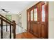 Spacious foyer featuring hardwood floors, staircase, stained glass door, and plenty of natural light at 202 Woodbridge Dr, Summerville, SC 29486
