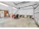 Spacious garage interior with equipment and brick stairs at 202 Woodbridge Dr, Summerville, SC 29486