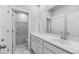 Bright bathroom featuring a white vanity, modern fixtures, and a doorway leading to a shower and toilet space at 216 Callibluff Dr, Summerville, SC 29486