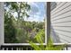 Balcony view overlooking lush greenery at 2329 Tall Sail Dr # 704D, Charleston, SC 29414