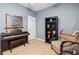 Bedroom featuring a keyboard, comfortable chair, and ample storage at 2329 Tall Sail Dr # 704D, Charleston, SC 29414