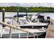Modern docks with boats offer convenient access to the water and stunning waterfront views at 2329 Tall Sail Dr # 704D, Charleston, SC 29414