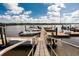 Modern docks with boats offer convenient access to the water and stunning waterfront views at 2329 Tall Sail Dr # 704D, Charleston, SC 29414