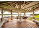 Inviting gazebo interior with seating and scenic waterfront views offers a tranquil retreat at 2329 Tall Sail Dr # 704D, Charleston, SC 29414