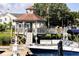 Charming gazebo on the dock with American flag, perfect for enjoying waterfront views and a relaxing atmosphere at 2329 Tall Sail Dr # 704D, Charleston, SC 29414