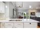 Kitchen area overlooking the living room featuring stainless steel appliances at 2329 Tall Sail Dr # 704D, Charleston, SC 29414