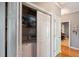 Convenient laundry area with a washing machine, dryer, and organized storage at 2329 Tall Sail Dr # 704D, Charleston, SC 29414