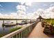 Scenic marina view with boardwalk, gazebo and multiple boats docked on the water at 2329 Tall Sail Dr # 704D, Charleston, SC 29414